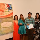 El guayaquileño Cristhian Godoy, junto a su obra de arte.