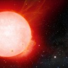 Impresión artística del planeta gaseoso "ultraesponjoso" orbitando una estrella enana roja.