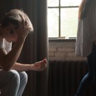 Young frustrated sad man holding wedding engagement ring, wife or girlfriend leaving depressed heartbroken husband, couple breaking up divorce concept, relationships breakup, proposal rejection