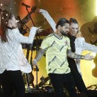 El colombiano Maluma durante su actuación este sábado en la inauguración del "FIFA Fan Festival" de Doha, en el que se interpretó el primer himno de la fiesta, "Tukoh Taka".El Mundial FIFA Qatar 2022 se disputará en el país árabe del 20 de noviembre al 18 de diciembre.