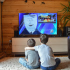 Niños viendo videos.