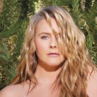 La actriz saltó a la fama en la década del 90 gracias a los videoclips de Aerosmith y al filme Clueless.