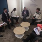 El presidente Lasso y sus ministros en un encuentro con funcionarios del FMI, en Davos.