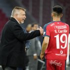 El entrenador Ever Hugo Almeida (i) resaltó el buen juego de El Nacional.