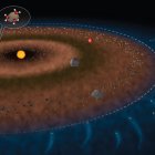 En la parte superior de la imagen, una burbuja muestra moléculas de agua adheridas a un fragmento rocoso.