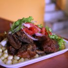 Tradición.- Un plato de la fritada ecuatoriana, considera uno de los mejores platos de cerdo del mundo.