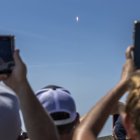 Titusville (Usa), 01/07/2023.- People observe from the Playa Linda beach as the ESA Euclid Telescope mission lifts off on a SpaceX Falcon 9 rocket from Launch Complex 40 at the Kennedy Space Center, Florida, USA, 01 July 2023. According to NASA, the Euclid is a European Space Agency (ESA) mission, with contributions from NASA, designed to explore the composition and evolution of the dark universe. It will make a 3D map of the universe by observing billions of galaxies out to 10 billion light-years across more than a third of the sky. Euclid will be launched to an observing orbit at the Sun-Earth L2 Lagrange point. (Estados Unidos) EFE/EPA/CRISTOBAL HERRERA-ULASHKEVICH