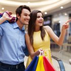 Woman showing something in the shopping mall