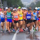 Daniel Pintado (c) fue el mejor ecuatoriano ubicado en la prueba de los 20 kilómetros marcha, tras terminar séptimo.