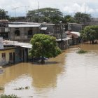 Referencial. Calles y casas inundadas.