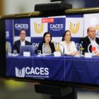 Cita. Dos autoridades del Caces y de la Senescyt.