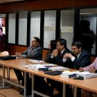 Diligencia. Defensores de los procesados durante la audiencia preparatoria de juicio que se realizó en la Corte.