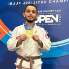 Luis Felipe luchó en la categoría cinturón café adulto peso leve.