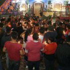 Acto. Migrantes hacen vigilia en solidaridad con víctimas del huracán Otis.