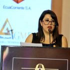 Referencia. La ministra Andrea Arrobo durante una ponencia sobre la minería responsable y su impacto ambiental.