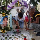 Familiares y amigos asisten hoy al velorio de Michelle Dayana González, una menor de 14 años que fue asesinada y descuartizada en un centro automotor, en Cali (Colombia).