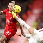 Liverpool (United Kingdom), 17/12/2023.- Kostas Tsimikas (L) of Liverpool in action against Antony of Manchester United during the Englilsh Premier League soccer match between Liverpool FC and Manchester United, in Liverpool, Britain, 17 December 2023. (Reino Unido) EFE/EPA/ADAM VAUGHAN EDITORIAL USE ONLY. No use with unauthorized audio, video, data, fixture lists, club/league logos, "live" services or NFTs. Online in-match use limited to 120 images, no video emulation. No use in betting, games or single club/league/player publications.
