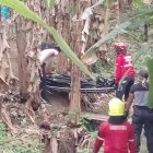Rescate. Agentes recuperaron el cuerpo que estaba entre plátanos.