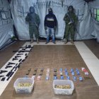 Evidencias. Las armas y municiones fueron encontradas escondidas.