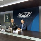 Iván Andrade, presidente del Directorio de la CFN, y Juan Izquierdo, gerente jurídico de la entidad.