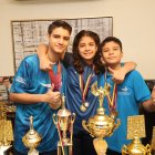 Gustavo (i), Isabella y Juan Martín han ganado medallas en múltiples torneos nacionales