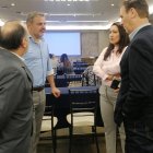 Empresario. André Obiol, empresario hotelero (izq.), en cita por el turismo.