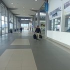 Ausencia. Menos del     20 % de las instalaciones de la terminal es ocupada por las cooperativas y comercios.