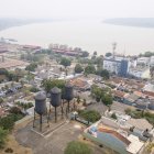 - Fotografía aérea que muestra la capa de humo provocada por los incendios el pasado jueves en la ciudad de Porto Velho (Brasil). Porto Velho, la ciudad más contaminada de Brasil, trata cada vez más casos de pulmonía y otros problemas respiratorios debido a la ola de incendios, pero casi ningún habitante usa mascarilla por falta de costumbre o de conocimiento. EFE/ Isaac Fontana