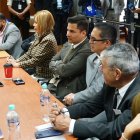 Procesados. Claudia Garzón (i) estuvo en la misma mesa con el expresidente de la Judicatura, Wilman Terán.