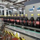 la nueva línea producirá presentaciones familiares en vidrio y REF PET (plástico retornable).