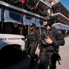 New Orleans (United States), 02/01/2025.- Members of the New Orleans Police Department walk Bourbon Street before it is reopened to the public in New Orleans, Louisiana, USA, 02 January 2025. At least 15 people are dead and 35 injured after the driver of a white pickup truck slammed into a crowd of people on Bourbon Street on 01 January 2025 and then opened fire with a gun. The FBI identified the driver as Shamsud-Din Jabbar, a US citizen from Texas and Army veteran. He was killed in a shootout with police. (Nueva Orleáns) EFE/EPA/DAN ANDERSON