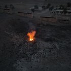 Damascus (Syrian Arab Republic), 05/01/2025.- An aerial photograph taken with a drone shows fire at the site of a damaged weapons depot after a blast near Damascus, Syria, 05 January 2025. According to the Syrian Observatory for Human Rights, blasts rocked the Kisweh area on the outskirts of the Syrian capital of Damascus housing weapons depots belonging to the ousted government of former president Bashar al-Assad. (Siria, Damasco) EFE/EPA/AHMAD FALLAHA