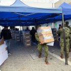 Los militares son los encargados de la seguridad en los recintos electorales.