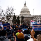 WASHINGTON, DC - FEBRUARY 11: People listen as Everett Kelley, President of the American Federation of Government Employees (AFGE) Union, during a "Save the Civil Service" rally outside the U.S. Capitol on February 11, 2025 in Washington, DC. Unionized federal workers and members of congress denounced President Trump and his alliesincluding Elon Musk, head of the so-called "Department of Government Efficiency" (Doge)for purging federal prosecutors, forcing out civil servants with dubious buyouts, and attempting to shutter USAID, all while branding government employees the "enemy of the people."   Kent Nishimura/Getty Images/AFP (Photo by Kent Nishimura / GETTY IMAGES NORTH AMERICA / Getty Images via AFP)