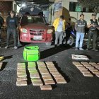 En el balde de la camioneta había dos sacos de yute y una mochila color verde.