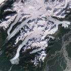 Imagen, tomada por el satélite Sentinel-2 en 2017,  que muestra el deshielo de los glaciares Scott (izquierda), Sheridan (centro) y Childs (derecha). Crédito: Copernicus Sentinel data 2017