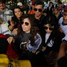 Dalma (c) y Giannina Maradona (c-d), hijas de Diego Armando Maradona llegando este martes 11 de marzo a los tribunales de San Isidro en Buenos Aires, Argentina.