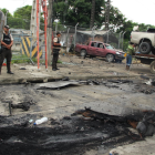 Los restos desprendidos de los vehículos quedaron en las cercanías del centro carcelario.