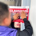 Un funcionario de Acess colocó un sello de clausura al establecimiento en Urdesa Norte.