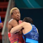 Jeremy Peralta (i) fue quinto en los 67 kg e igualmente clasificó.