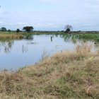 Santa Lucía. Todavía se ve el agua que queda de la inundación que hubo.