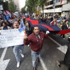Los asistentes a la marcha llegaron con carteles y banderas.