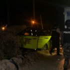 El levantamiento del cuerpo del taxista asesinado en el lugar del suceso