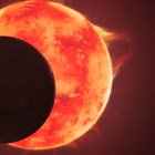 Sistema. Representación artística del planeta TRAPPIST-1 d pasando por delante de su estrella.