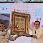 Tomás Angulo y Karina Iturralde, representantes de Sabor Amar, ganaron el concurso de paella en Sueca, Valencia.