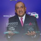 José Delgado con sus dos reconocimientos.