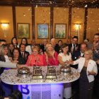 Momento en que la Bolsa de Valores de Guayaquil hace su centésimo toque de campana.