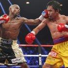 Floyd Mayweather Jr. (i) y Manny Pacquiao se enfrentaron en 2015.