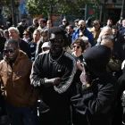 Colectivos antirracistas y de migrantes de Madrid se concentran en la plaza de Lavapiés.