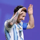 Lionel Messi festeja uno de sus tres goles ante Argelia.